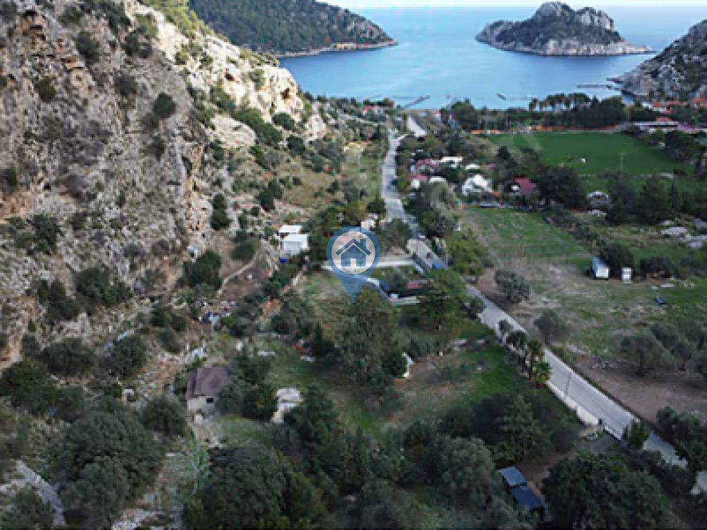 MARMARIS ÇIFTLIK KOYUNDA DENIZ MANZARALI 2400M² SATILIK TARLA